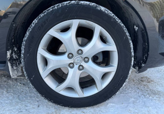 Подержанный автомобиль Mazda CX-7 2011 года (15 фото)