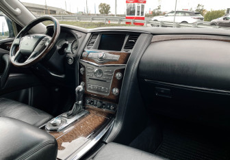 Подержанный автомобиль Infiniti QX56 2013 года (9 фото)