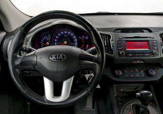 Подержанный автомобиль Kia Sportage 2012 года (21 фото)