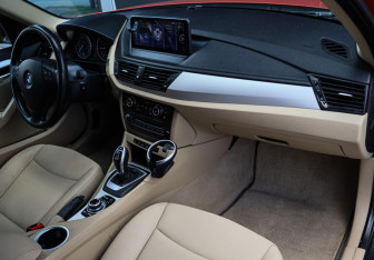 Подержанный автомобиль BMW X1 2013 года (7 фото)
