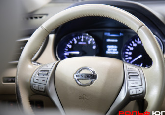 Подержанный автомобиль Nissan X-Trail 2016 года (13 фото)