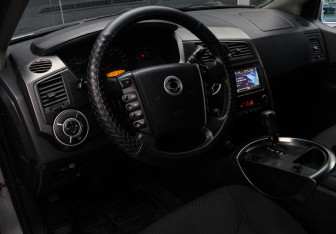 Подержанный автомобиль SsangYong Kyron 2010 года (14 фото)