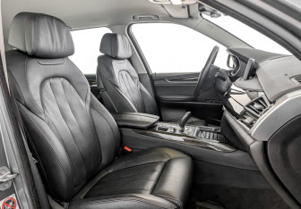 Подержанный автомобиль BMW X5 2016 года (24 фото)