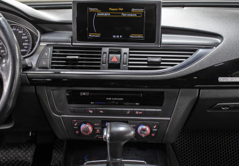 Подержанный автомобиль Audi A7 2014 года (15 фото)