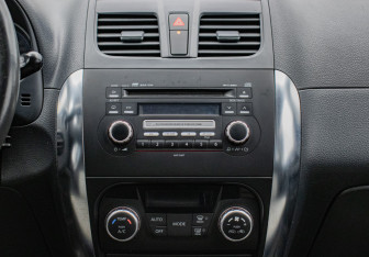 Подержанный автомобиль Suzuki SX4 Hatchback 2010 года (14 фото)