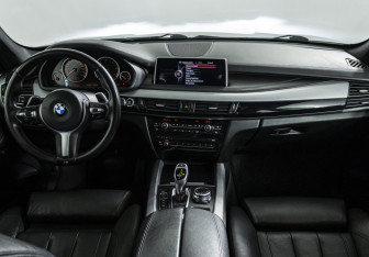 Подержанный автомобиль BMW X5 2015 года (13 фото)