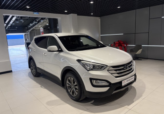 Подержанный автомобиль Hyundai Santa Fe 2014 года (5 фото)