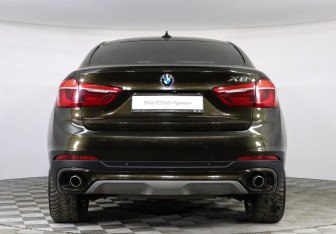 Подержанный автомобиль BMW X6 2015 года (4 фото)