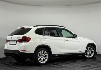 Подержанный автомобиль BMW X1 2013 года (2 фото)