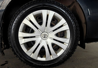 Подержанный автомобиль Toyota Corolla Sedan 2010 года (18 фото)