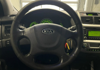 Подержанный автомобиль Kia Sportage 2010 года (14 фото)