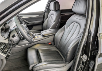 Подержанный автомобиль BMW X6 2018 года (20 фото)