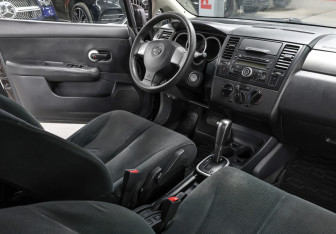 Подержанный автомобиль Nissan Tiida Sedan 2011 года (11 фото)