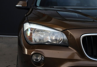 Подержанный автомобиль BMW X1 2012 года (16 фото)