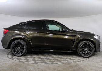 Подержанный автомобиль BMW X6 2015 года (6 фото)