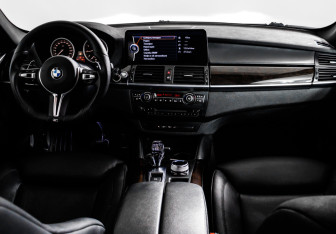 Подержанный автомобиль BMW X6 2011 года (11 фото)