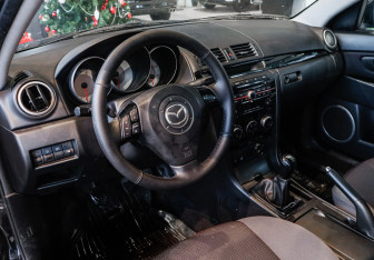 Подержанный автомобиль Mazda 3 Sedan 2008 года (12 фото)