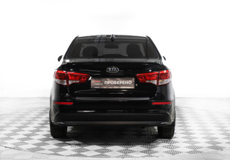 Подержанный автомобиль Kia Rio Sedan 2015 года (19 фото)