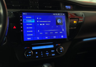 Подержанный автомобиль Toyota Corolla Sedan 2013 года (31 фото)