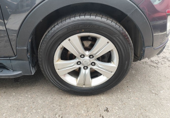 Подержанный автомобиль Kia Sportage 2012 года (12 фото)