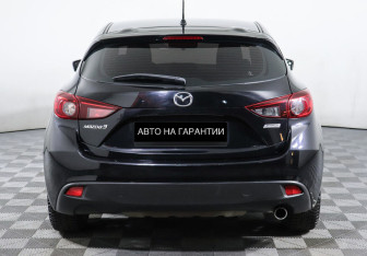 Подержанный автомобиль Mazda 3 Hatchback 2013 года (4 фото)