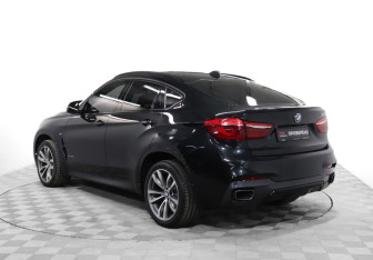 Подержанный автомобиль BMW X6 2015 года (7 фото)