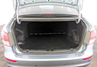 Подержанный автомобиль Kia Rio Sedan 2015 года (10 фото)