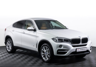 Подержанный автомобиль BMW X6 2016 года (3 фото)