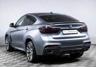 Подержанный автомобиль BMW X6 2016 года (7 фото)