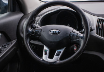 Подержанный автомобиль Kia Sportage 2015 года (15 фото)