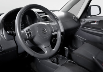 Подержанный автомобиль Suzuki SX4 Sedan 2008 года (14 фото)