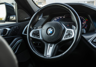 Подержанный автомобиль BMW X6 2021 года (11 фото)
