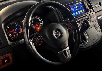 Подержанный автомобиль Volkswagen Multivan 2011 года (11 фото)