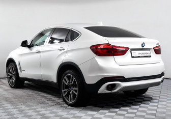 Подержанный автомобиль BMW X6 2016 года (7 фото)