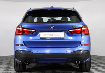 Подержанный автомобиль BMW X1 2016 года (4 фото)