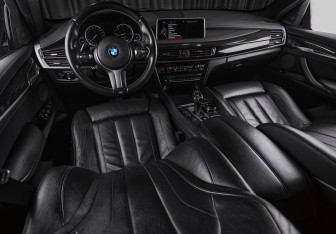 Подержанный автомобиль BMW X6 2014 года (23 фото)