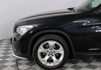 Подержанный автомобиль BMW X1 2014 года (8 фото)