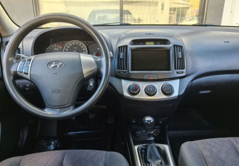 Подержанный автомобиль Hyundai Elantra Sedan 2010 года (13 фото)