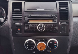 Подержанный автомобиль Nissan Tiida Sedan 2008 года (15 фото)
