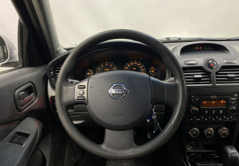 Подержанный автомобиль Nissan Almera Classic 2013 года (14 фото)