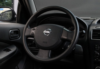 Подержанный автомобиль Nissan Almera Classic 2011 года (11 фото)