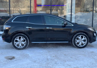 Подержанный автомобиль Mazda CX-7 2011 года (4 фото)