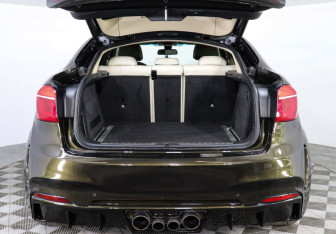 Подержанный автомобиль BMW X6 2015 года (9 фото)