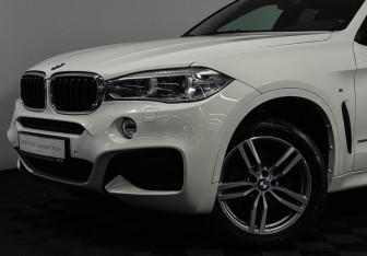 Подержанный автомобиль BMW X6 2018 года (20 фото)