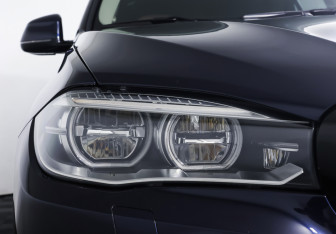 Подержанный автомобиль BMW X5 2016 года (22 фото)