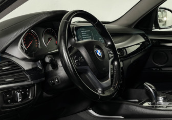 Подержанный автомобиль BMW X6 2016 года (11 фото)