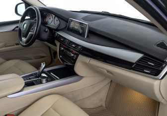 Подержанный автомобиль BMW X5 2018 года (13 фото)