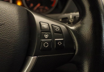 Подержанный автомобиль BMW X5 2012 года (10 фото)