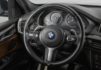 Подержанный автомобиль BMW X5 2014 года (16 фото)