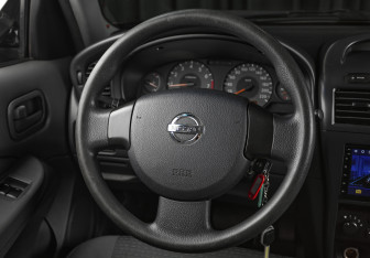 Подержанный автомобиль Nissan Almera Classic 2006 года (10 фото)